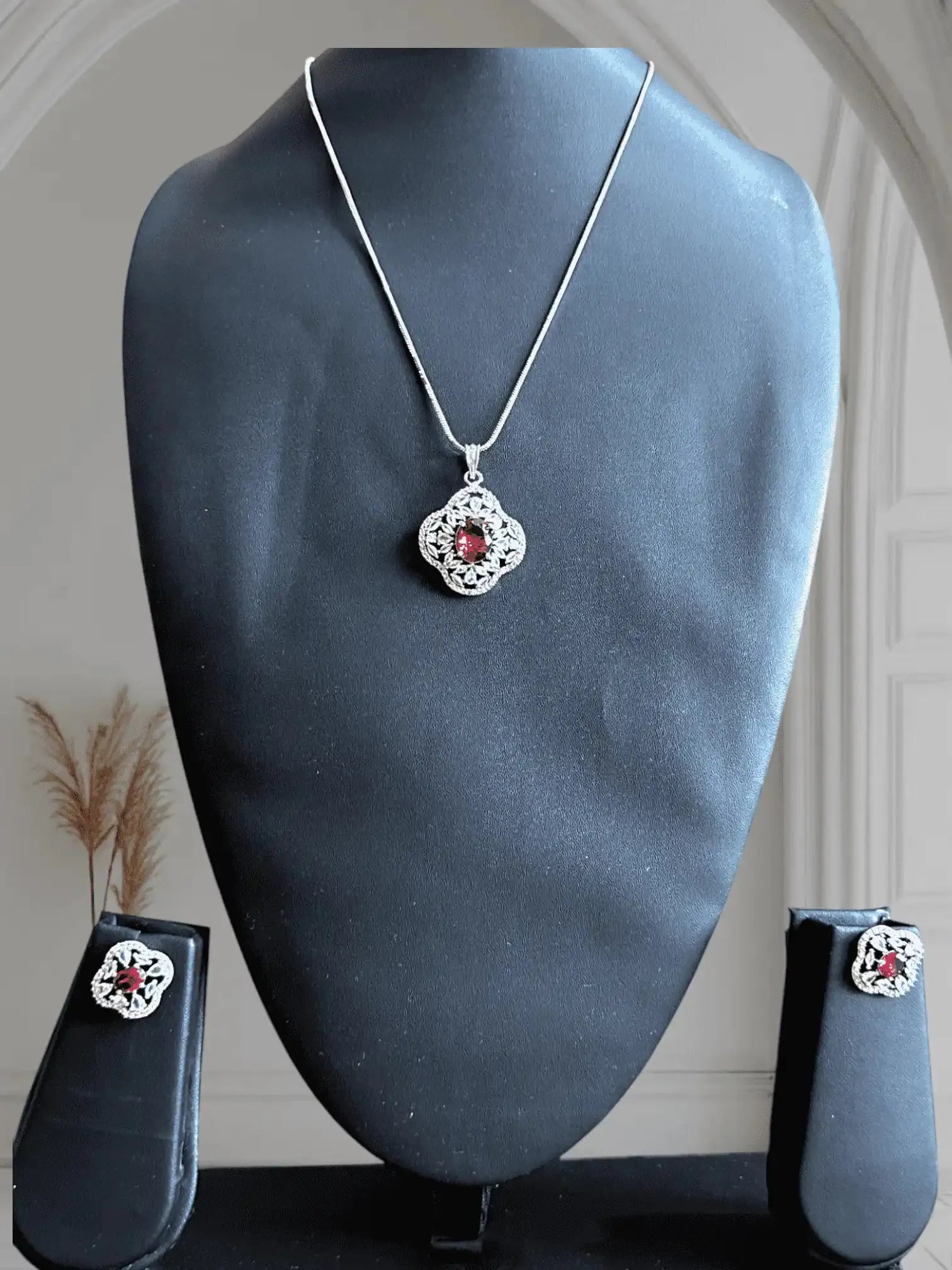 Elegant Silver Tone Ruby and Diamond Style Pendant Necklace & Earrings Set.