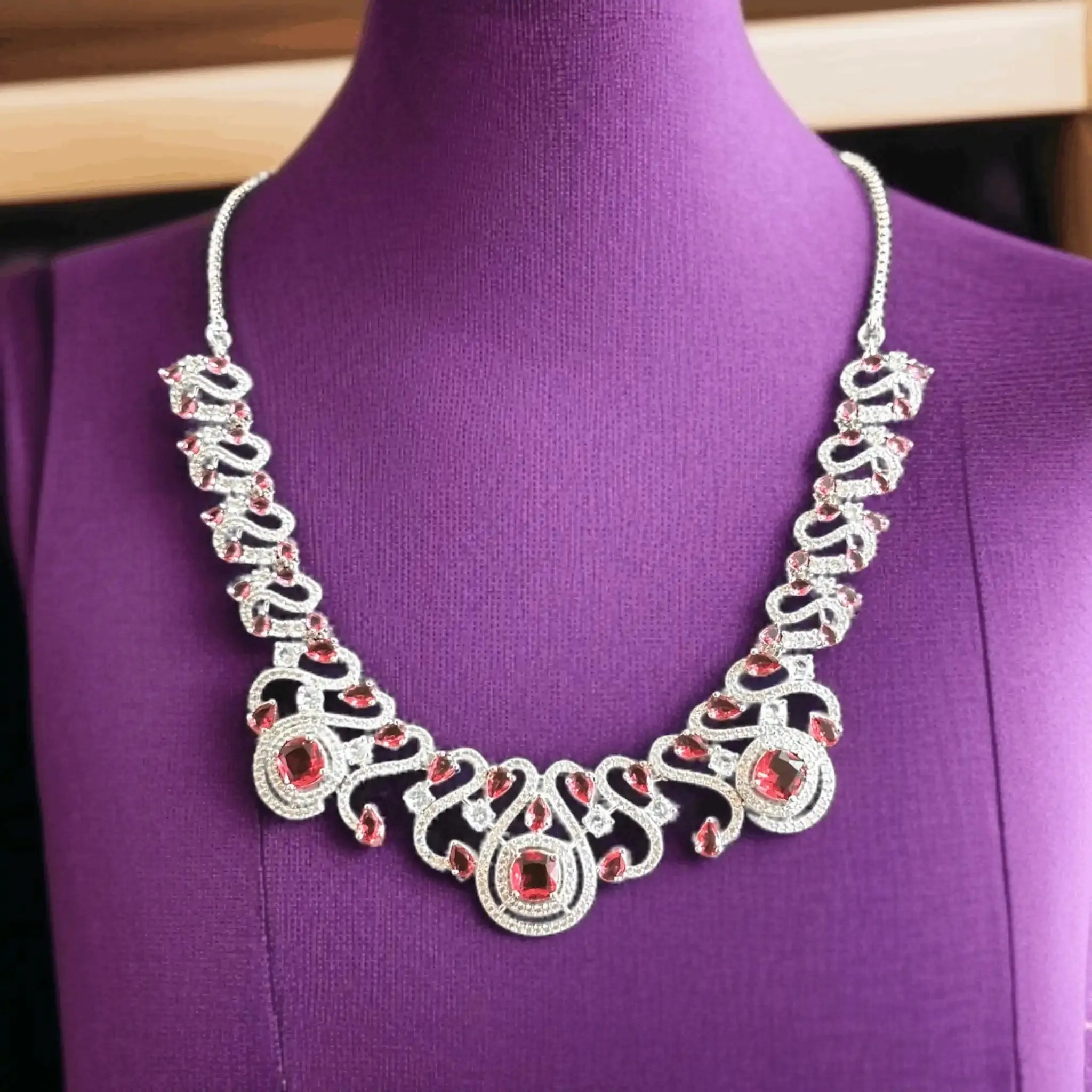 Ornate Crystal and Deep Red Stone Necklace Set.