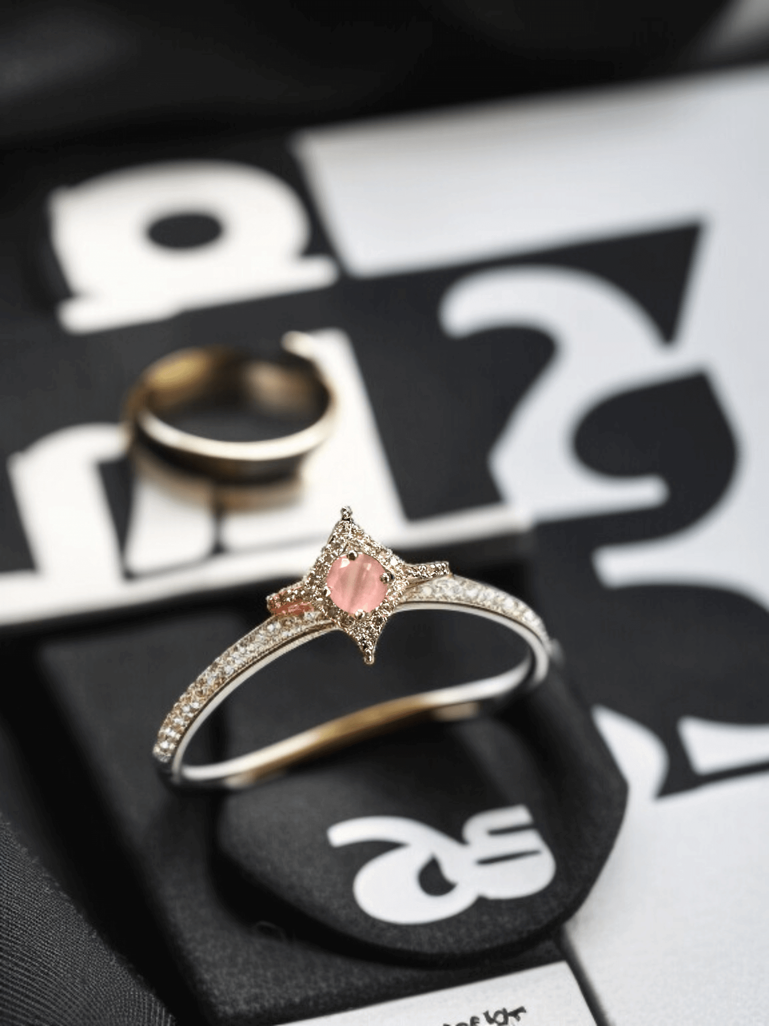Delicate Kite-Shaped Pink Gemstone Ring with Diamond Accents.